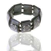 Pulsera Hueso Flores. Precio set 5un