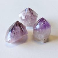 Pointe irrégulière en Améthyste polie (150-200grs)